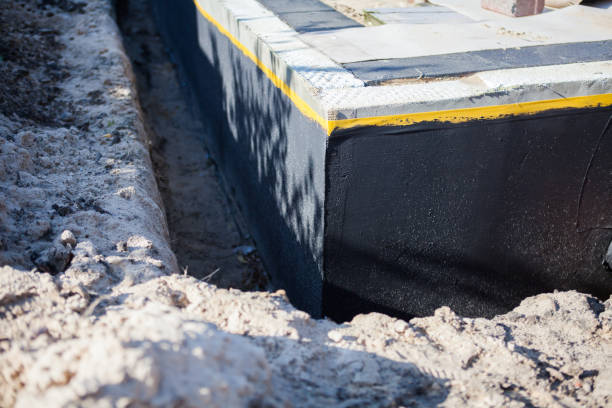 Professional Waterproofing technician working in Clifton, NJ